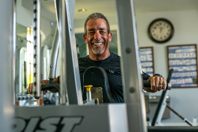 personal trainer in workout room